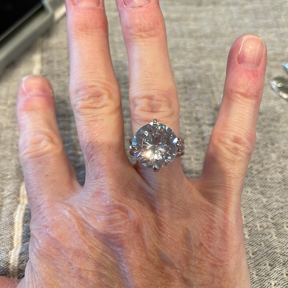 Silver solitaire ring, Crystal stone set in silver band setting.